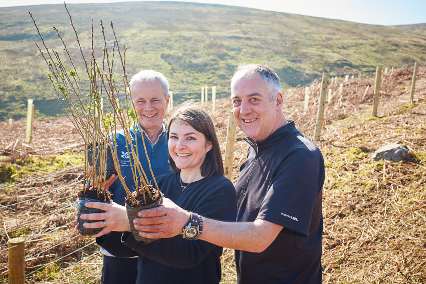 Peter Welsh, Sam Gibson and Martin Davies plant trees in upper Wharfedale